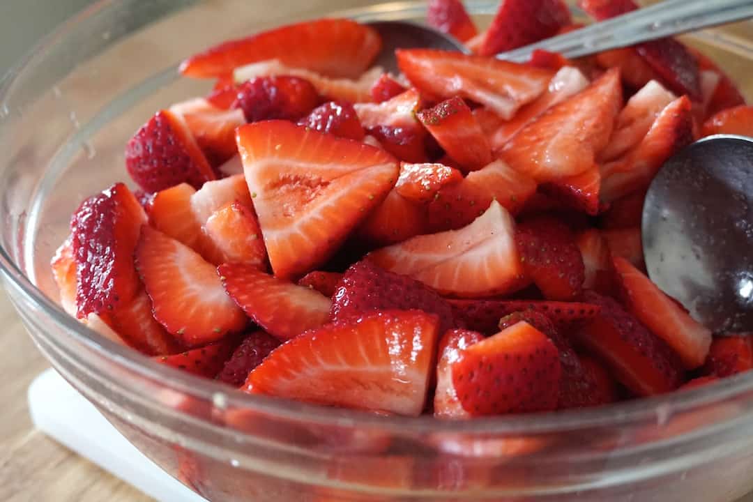 Freshly picked strawberries sliced up for the inside of the shortcakes