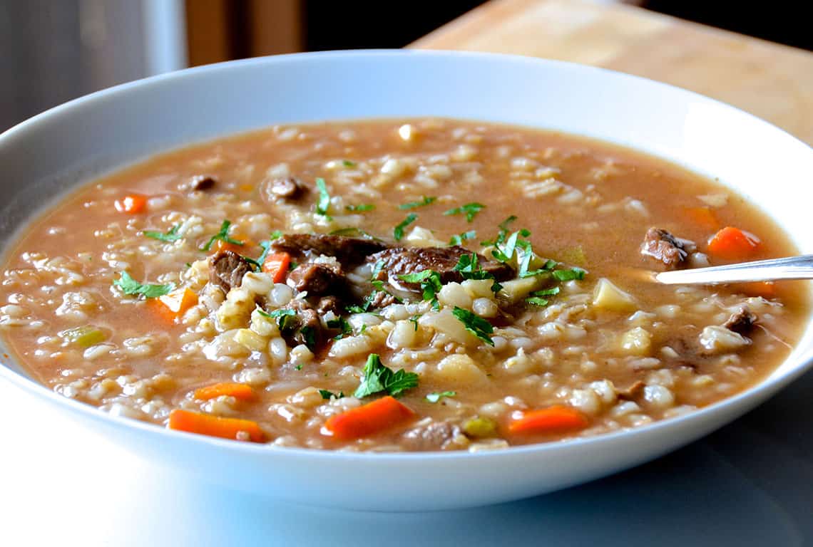 A bowl of the slow booker beef and barley soup