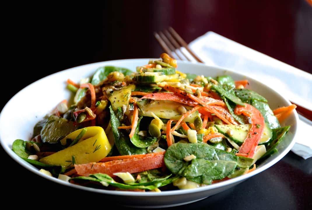 A bowl of our healthy spinach salad
