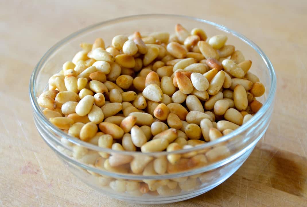 A bowl of lightly toasted pine nuts