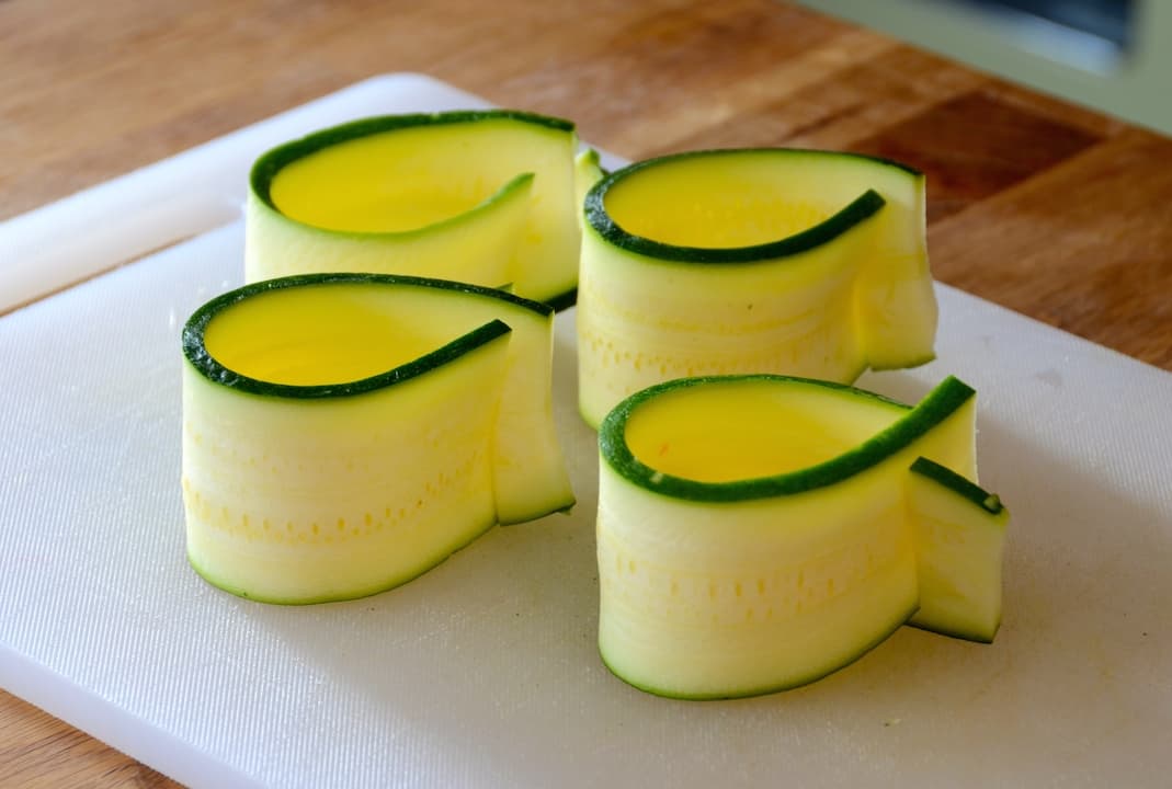 Thin strips of zucchini formed into salad cups
