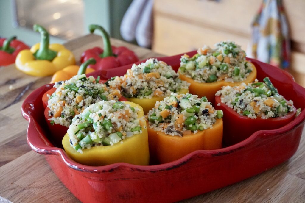 The peppers placed into an oven-safe baking dish.