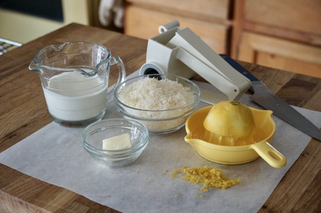 The ingredients for the lemony cream sauce include: cream, Parmesan, butter, lemon zest and lemon juice.