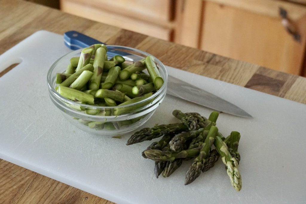 Freshly picked asparagus cut into bite size pieces.