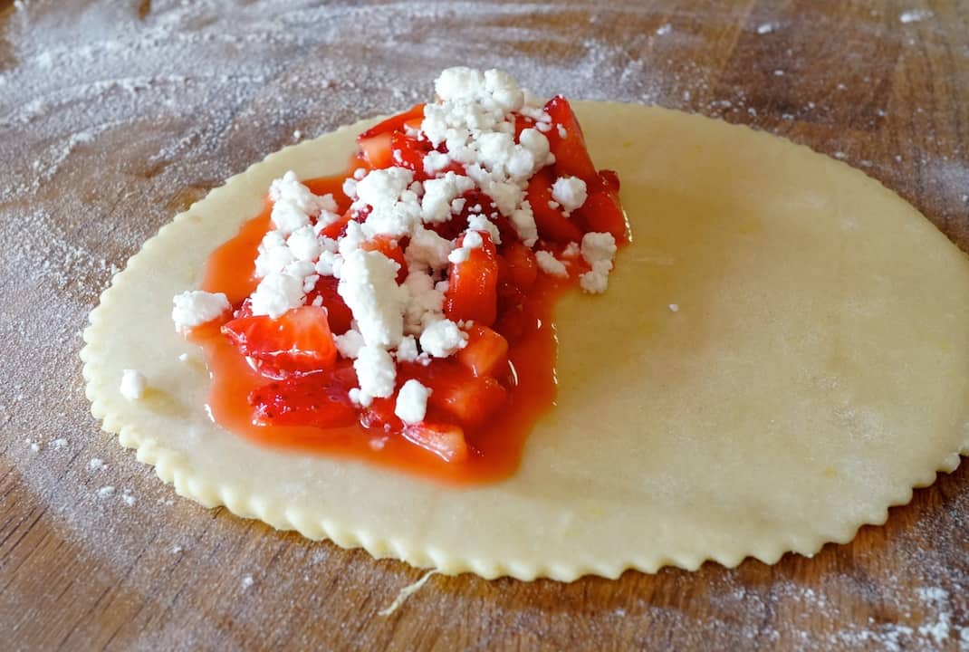 Hand pies filled with strawberries and the optional goat's cheese
