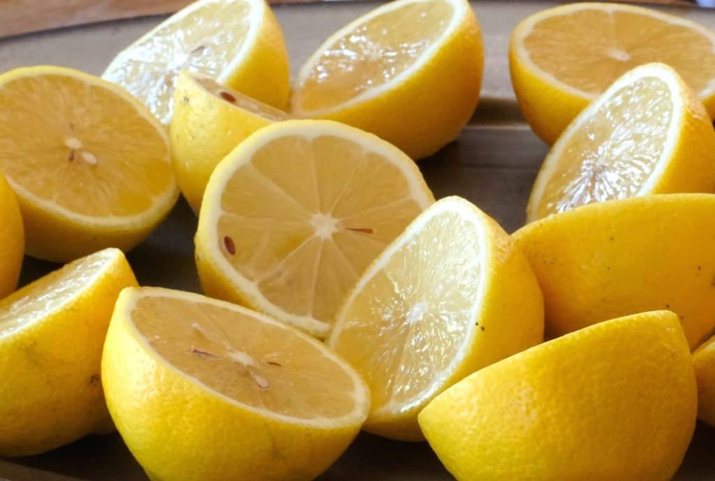 Lemons cut in half ready to be grilled