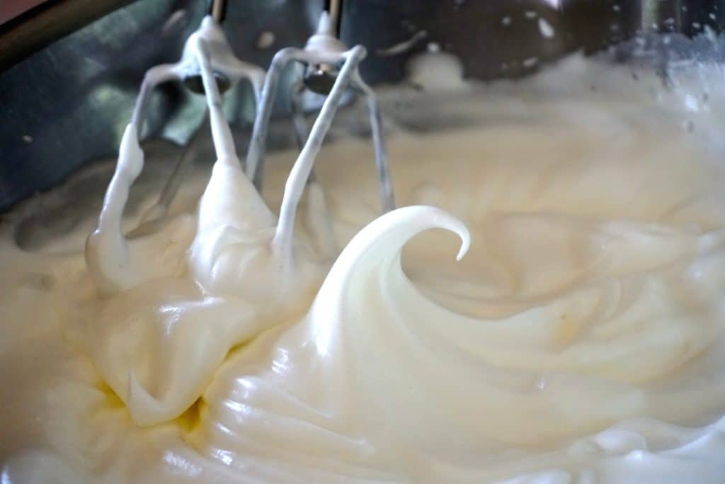 egg whites whipped to stiff peaks, ready for the folding in of the flour and sugar