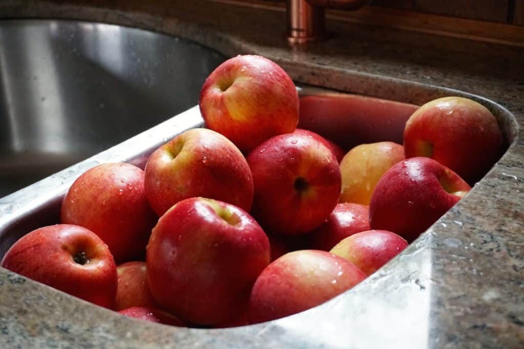 A sink full of apples