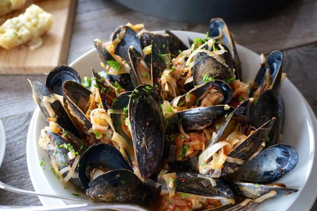 Steamed Mussels Recipe garnished and ready to be served