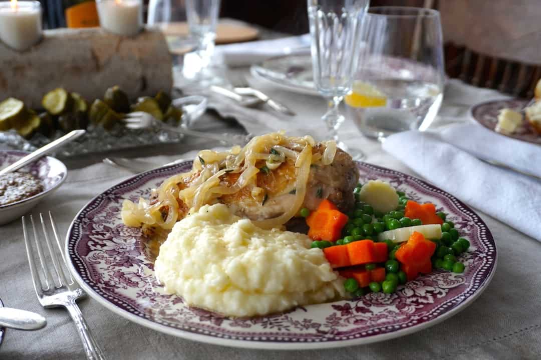 French Onion Chicken served with mashed potatoes and vegetables