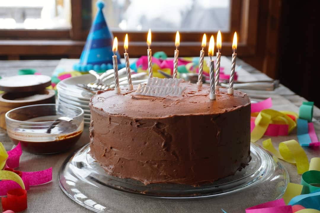 Homemade Chocolate Cake decorated with candles for a birthday!