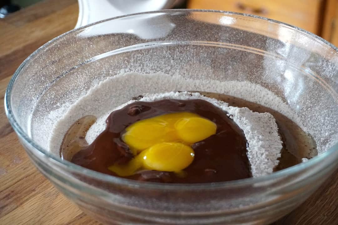 The dry ingredients sifted before the eggs and chocolate are added