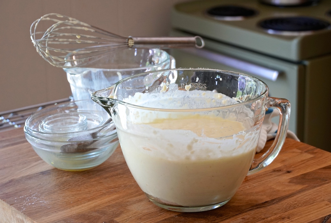 The batter whisked together in a large measuring cup 