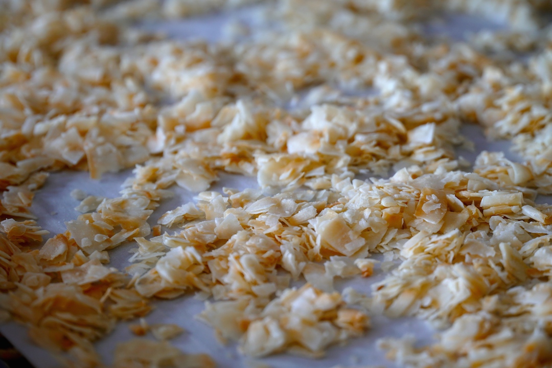 Large flakes of coconut toasted in the oven