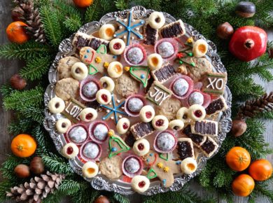 A silver tray filled with cookies from the best Christmas Cookie Recipes.
