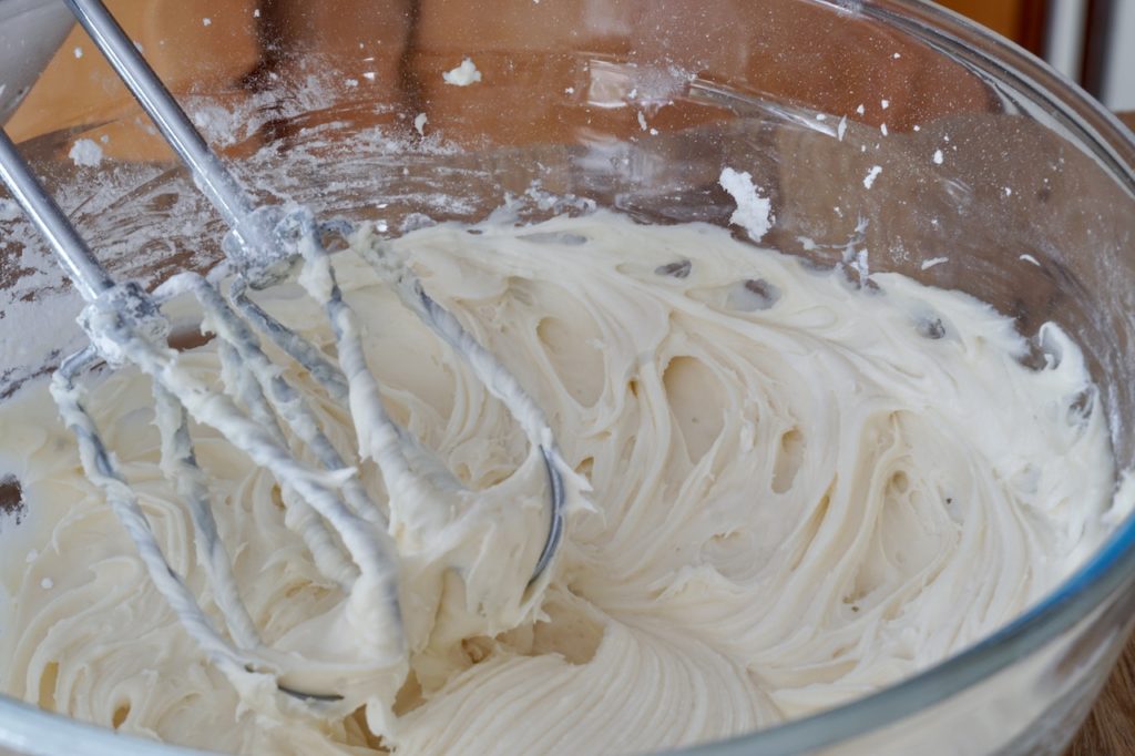 Creaming together a tangy, lemony icing