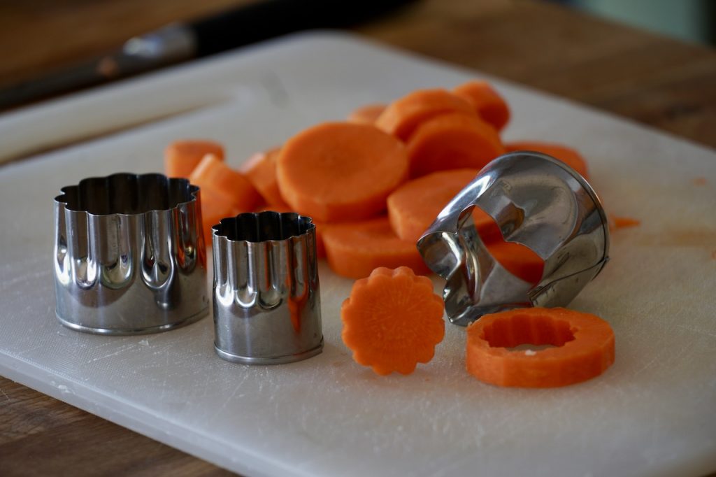 Use vegetable cutters to create flower shaped carrots
