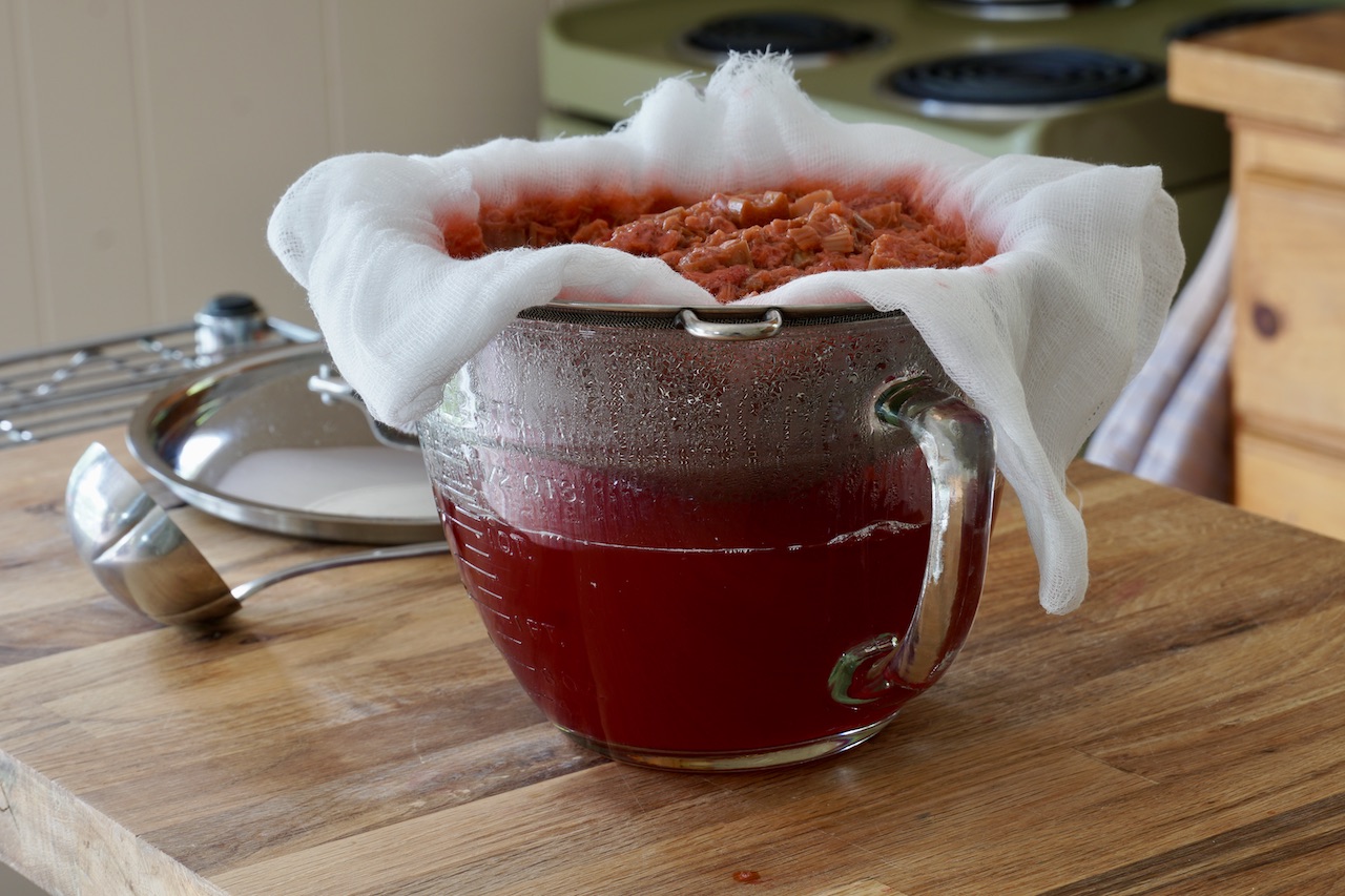 Straining the strawberry rhubarb juice