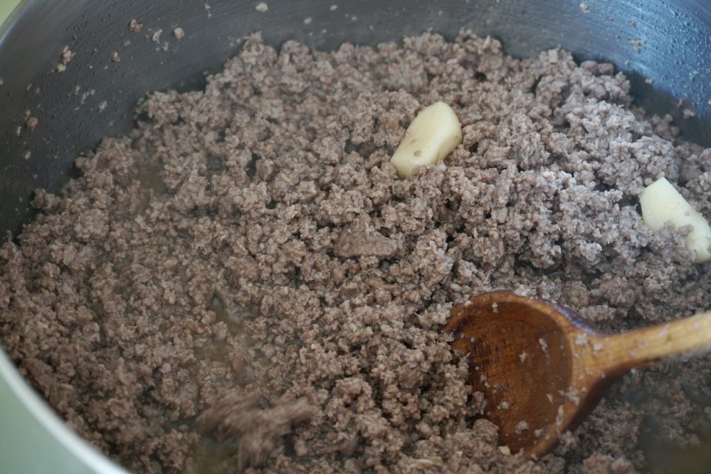The ground beef cooked and crumbles