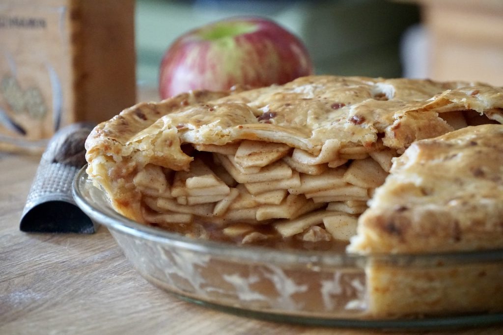 Layers of apples within the freshly baked pie