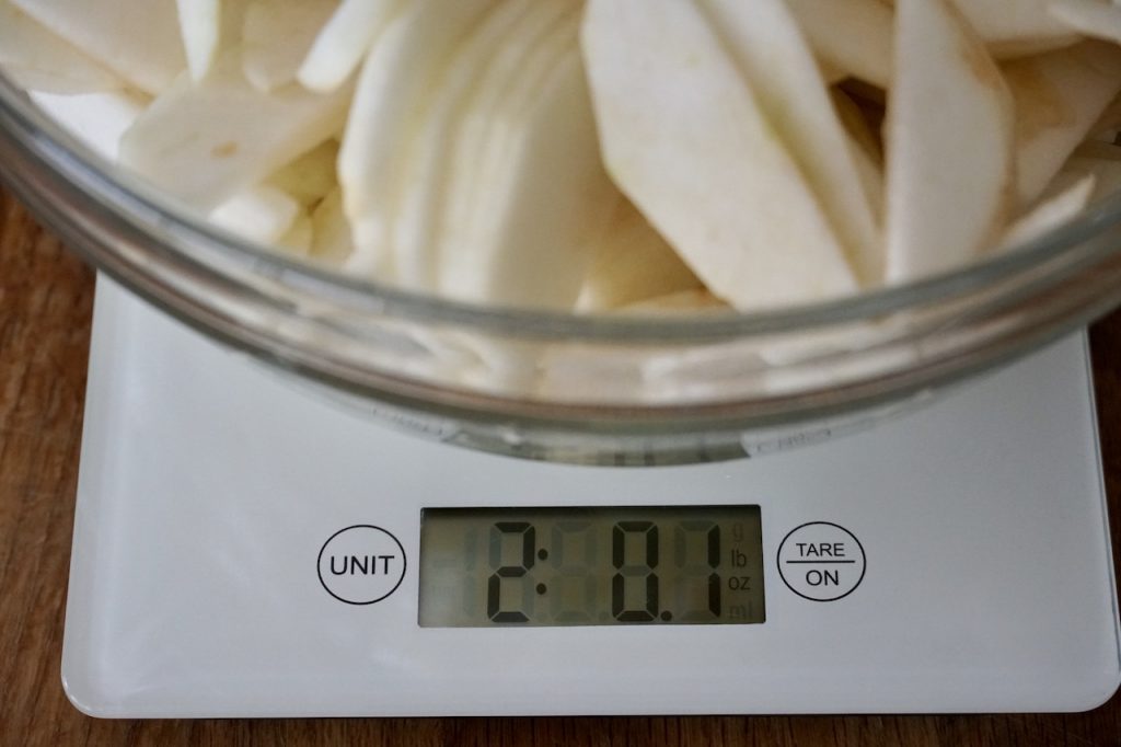 Two pounds of apples measured for the pie