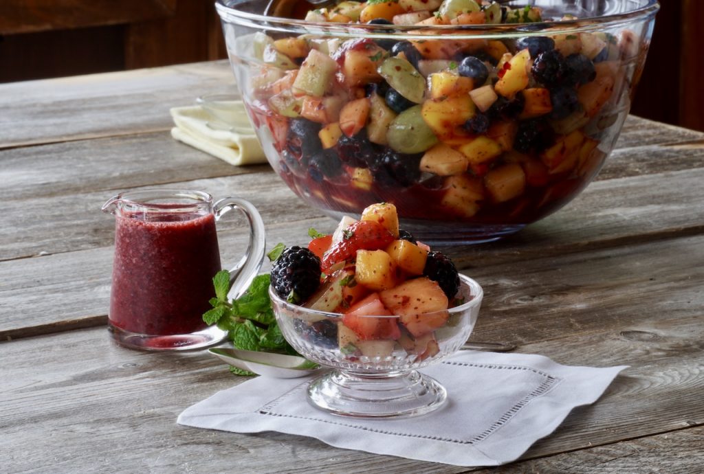 Healthy Fresh Fruit Salad with a side of the dressing