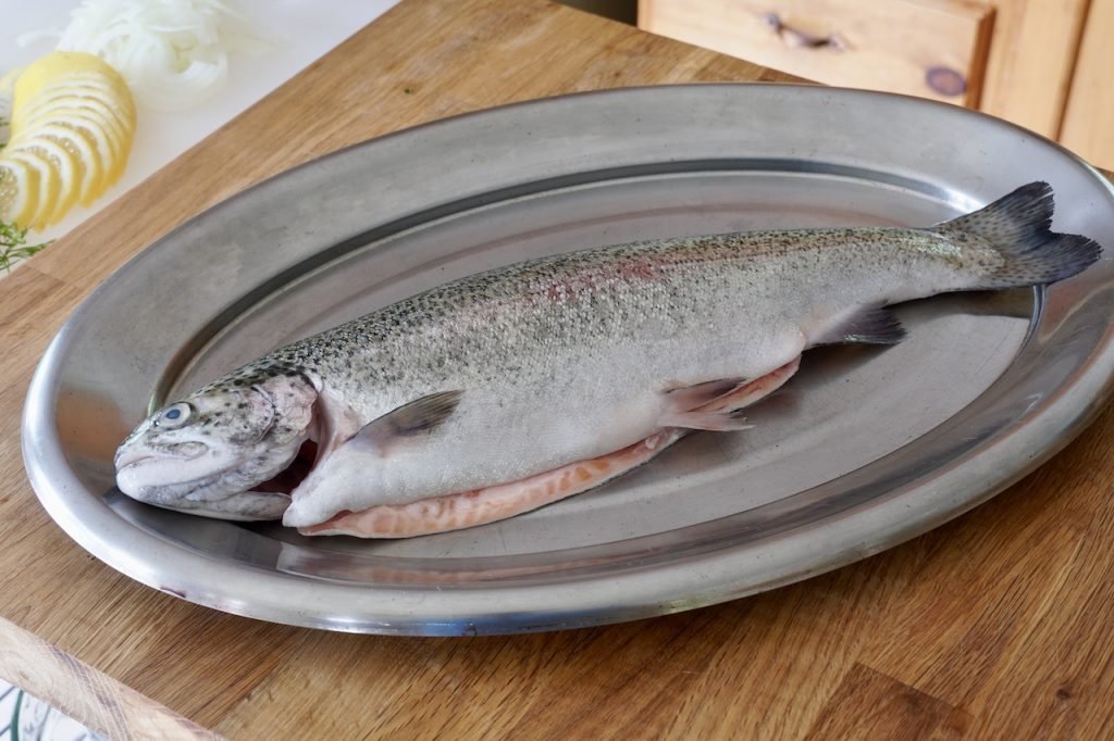 The whole trout cleaned and ready to be stuffed