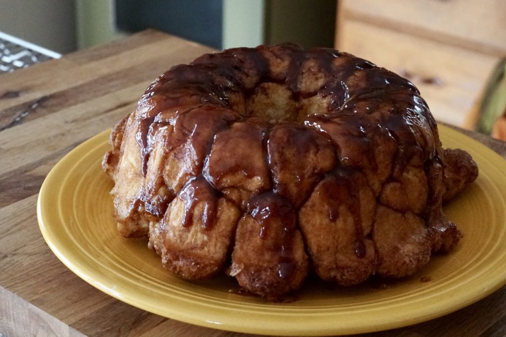 Caramel and cinnamon coating cascading down the monkey bread