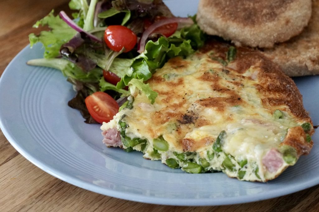 Ham and Asparagus Frittata served with tossed green salad and a toasted English muffin