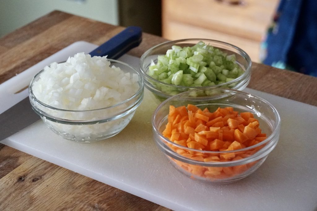 Onion, celery and carrot is used for the mirepoix for the stew