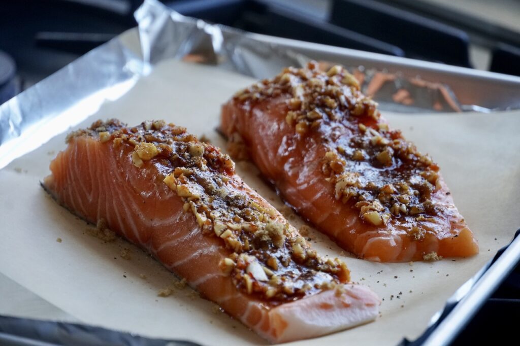 Salmon fillets topped with a garlic, ginger, chili sauce