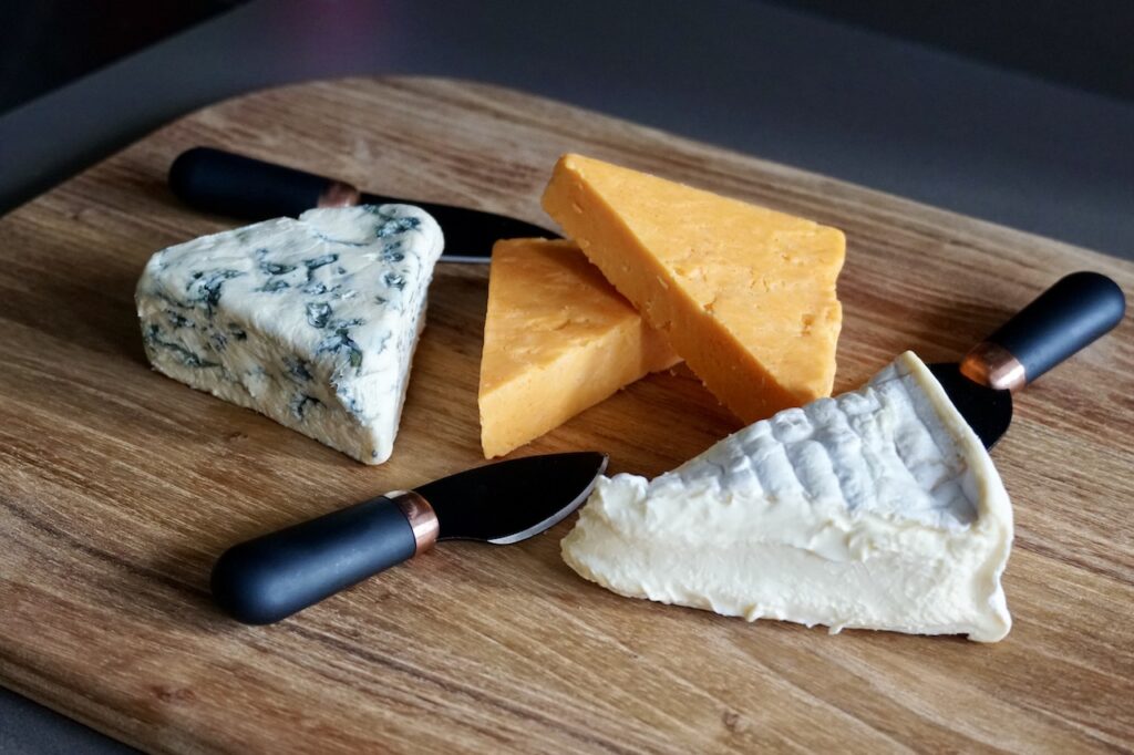 A selection of soft, crumbly and firm cheeses