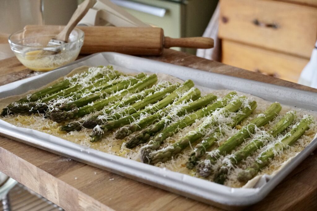 The asparagus tart topped with grated Parmesan cheese