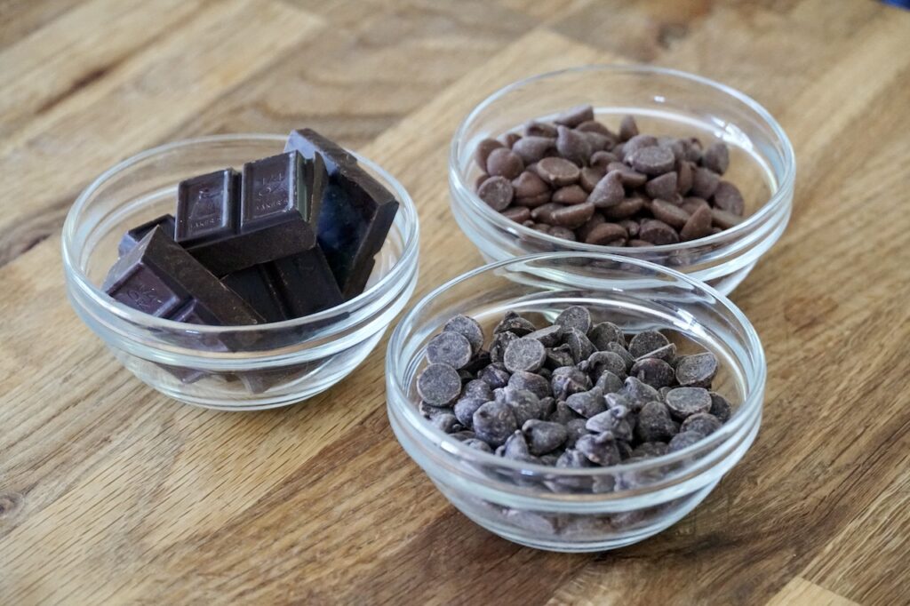 Bowls containing unsweetened, milk and semisweet chocolate