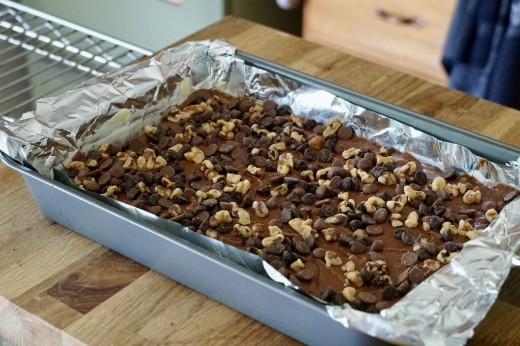 A rectangular pan of the brownies ready for the oven