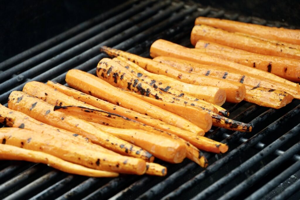 The carrots on the grill.