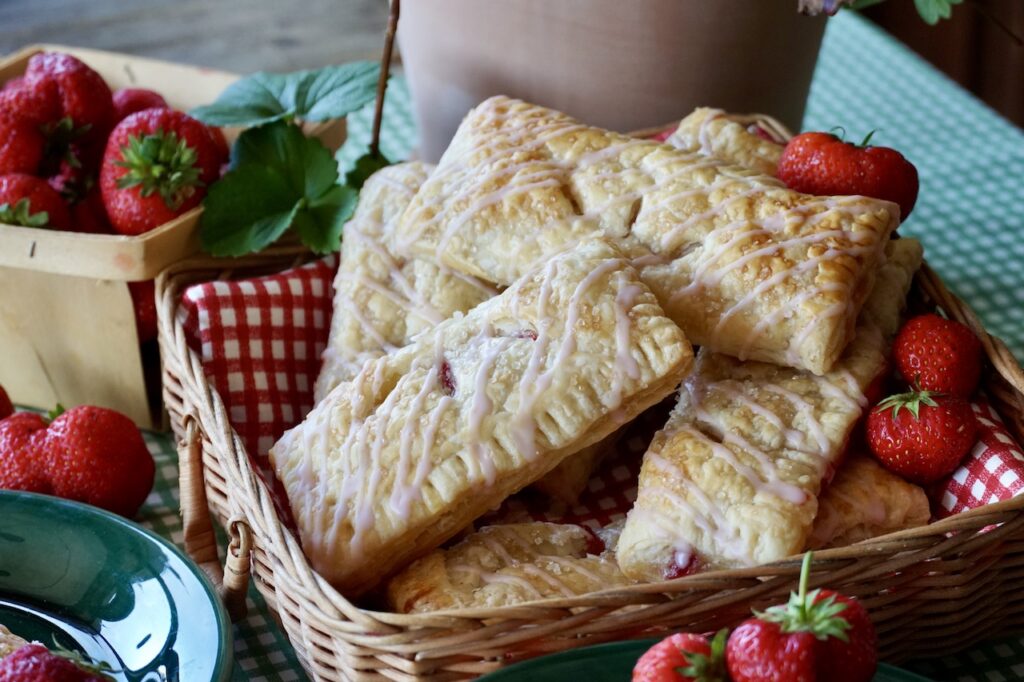Strawberry turnovers presented in an attractive wicker basket