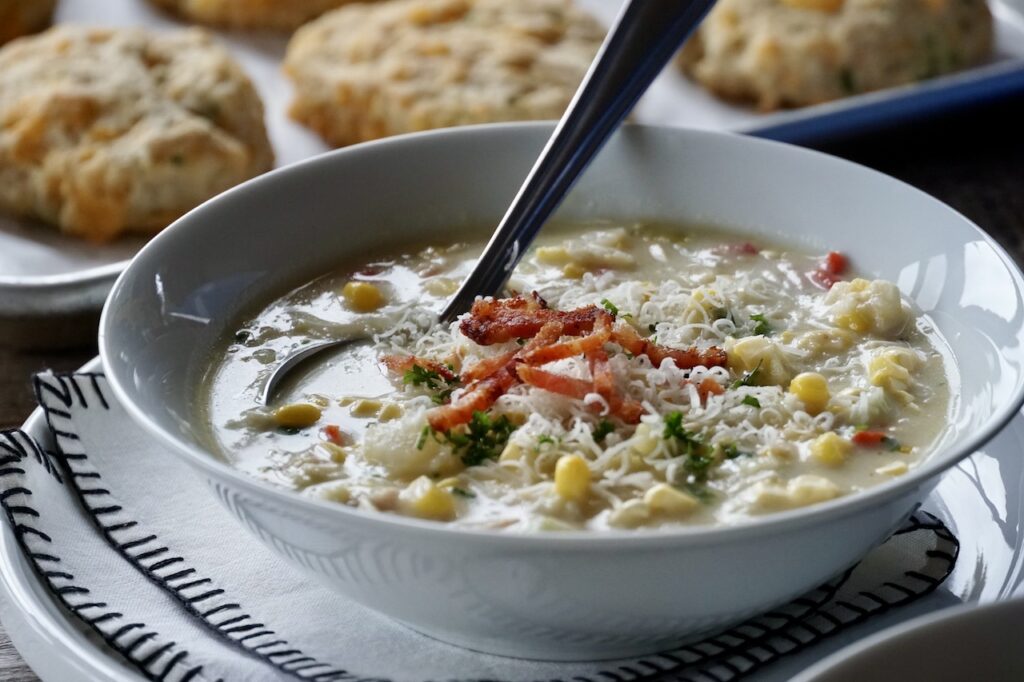 A steaming bowl of corn chowder