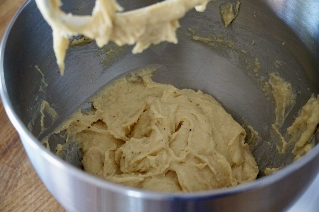 The pastry dough after the two cheeses have been added.