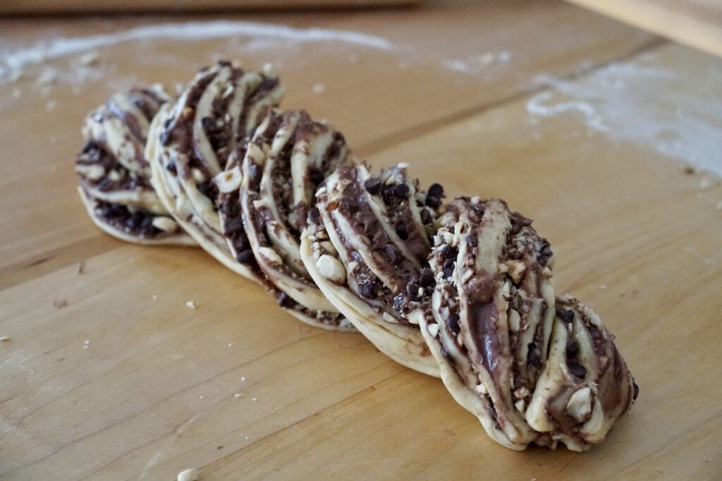 The babka after being split and braided.