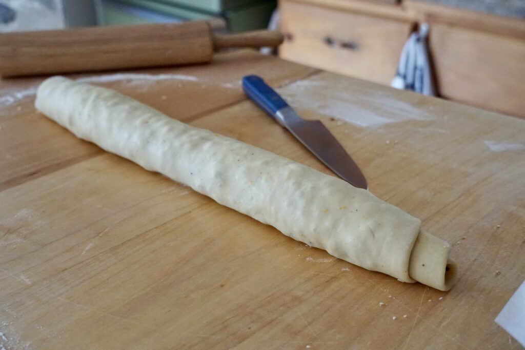The babka dough rolled up like a jelly roll.