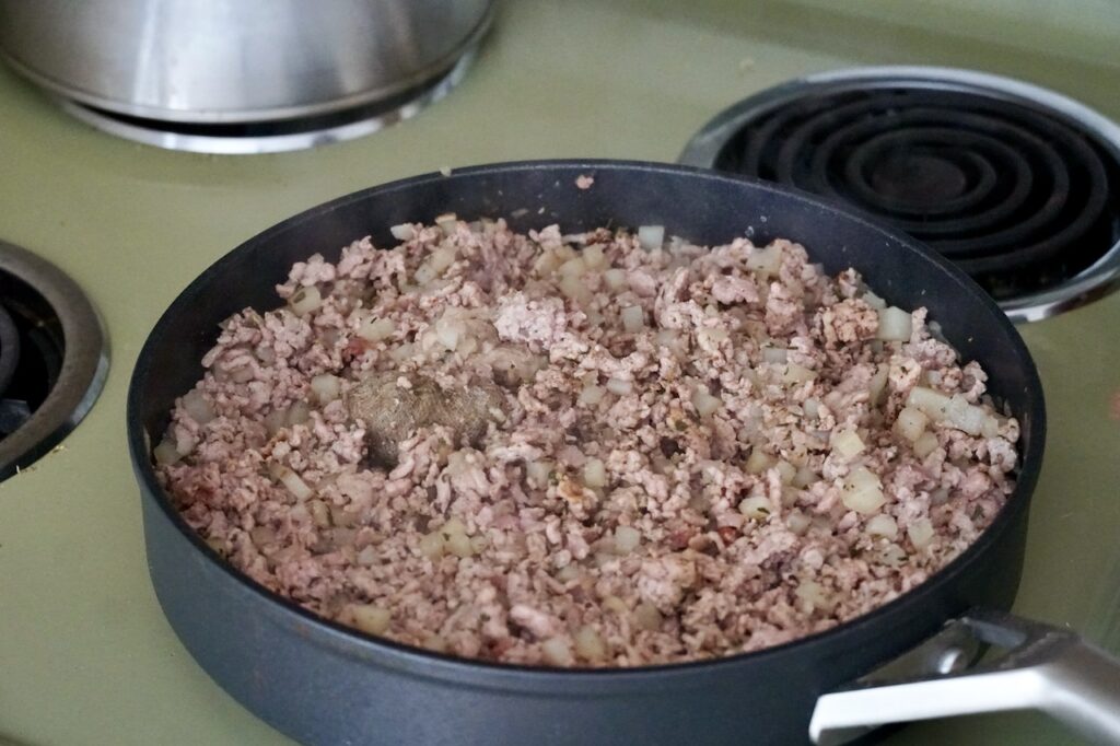The pie filling is prepared in a deep skillet.