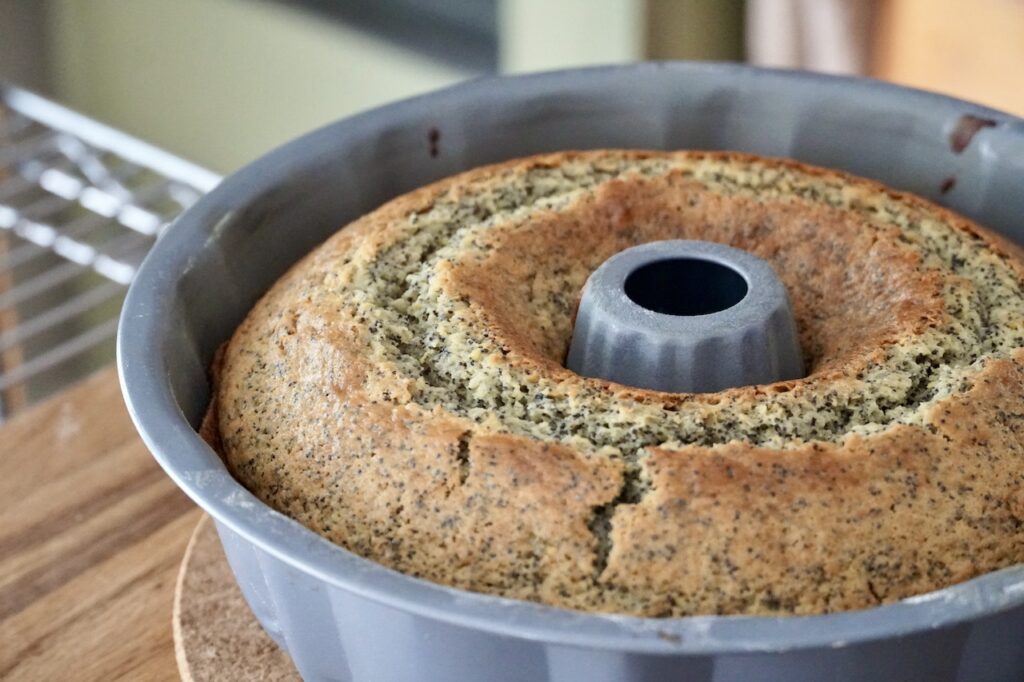The poppy seed cake fresh out of the oven, cooling on the counter.