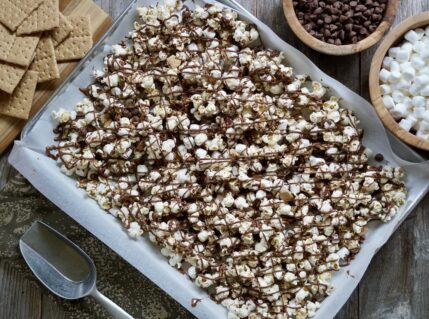 S'Mores Popcorn presented on a large baking sheet.