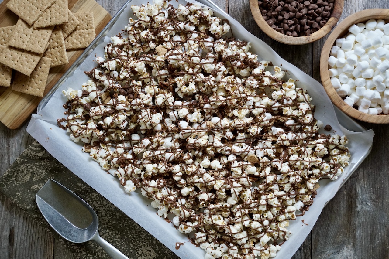 S'Mores Popcorn presented on a large baking sheet.