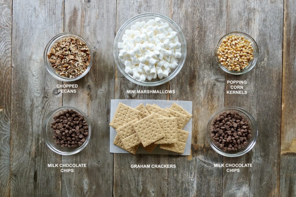 All of the ingredients needed to make S'Mores Popcorn.