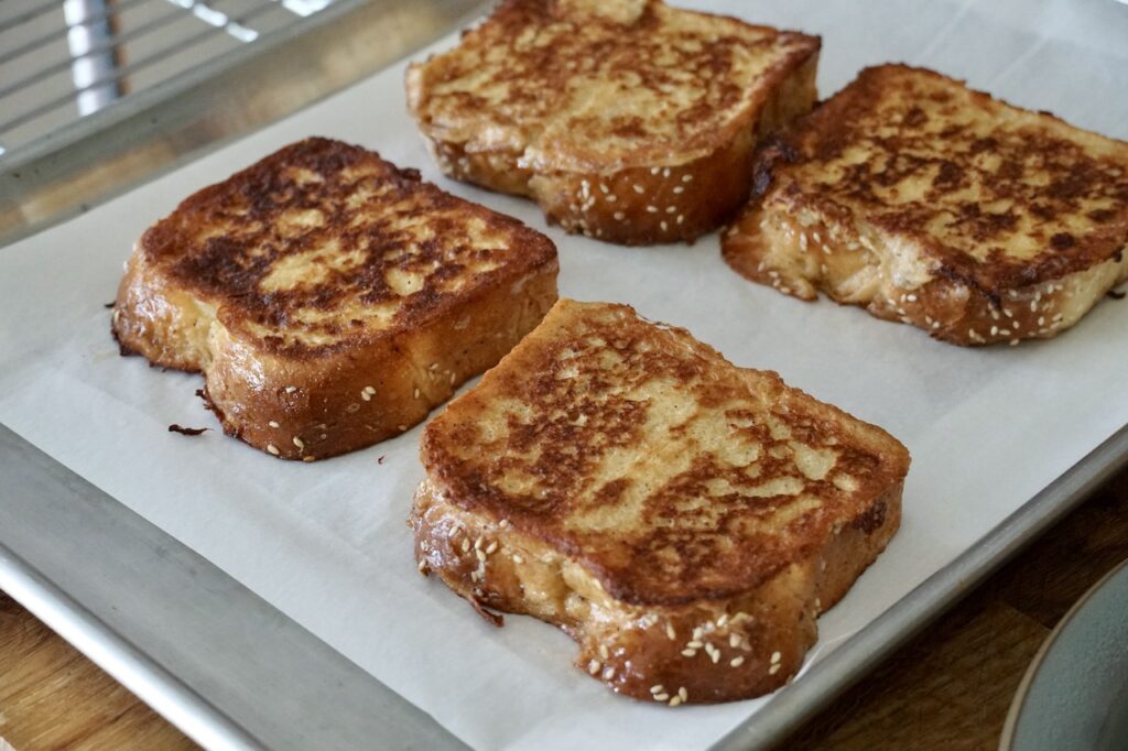 Piece of French toast cooked golden brown.