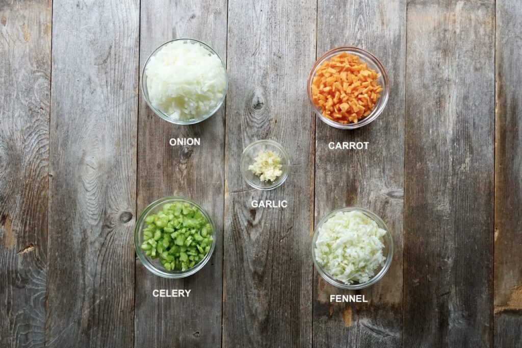 A soffritto or mirepoix is a mix of aromatic veggies including onions, carrot, celery, fennel and garlic.