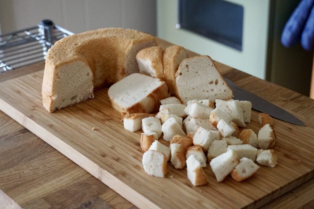 Angel food cake sliced and cut into 1-inch cubes.