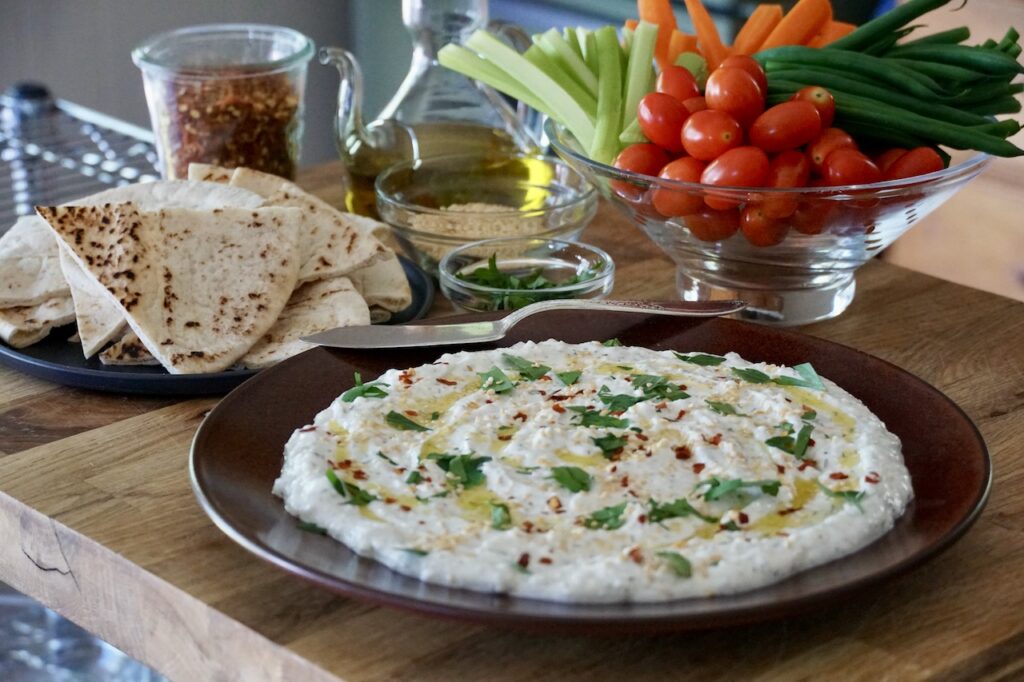 Feta Cheese Dip served with fresh veggies and warmed pita bread.